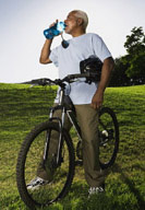 Senior biker water break