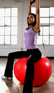 Sitting on pilates ball